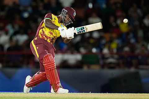 Sherfane Rutherford plays a shot against England